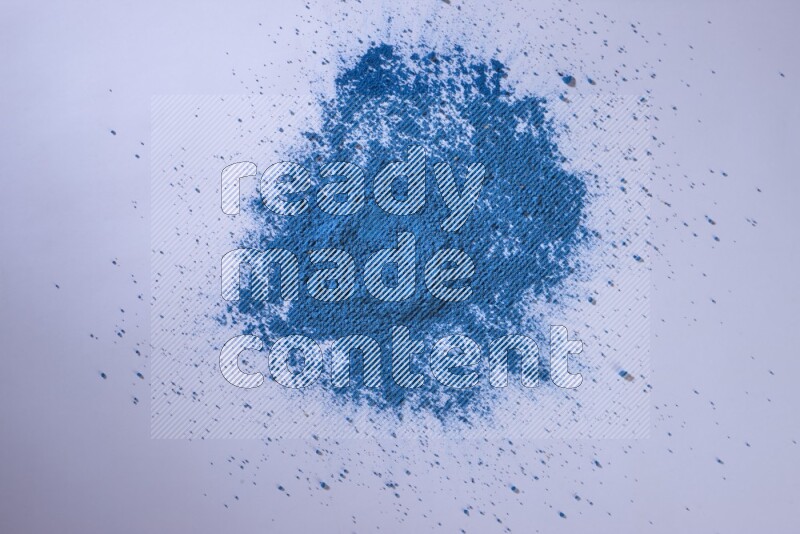Blue powder on white background
