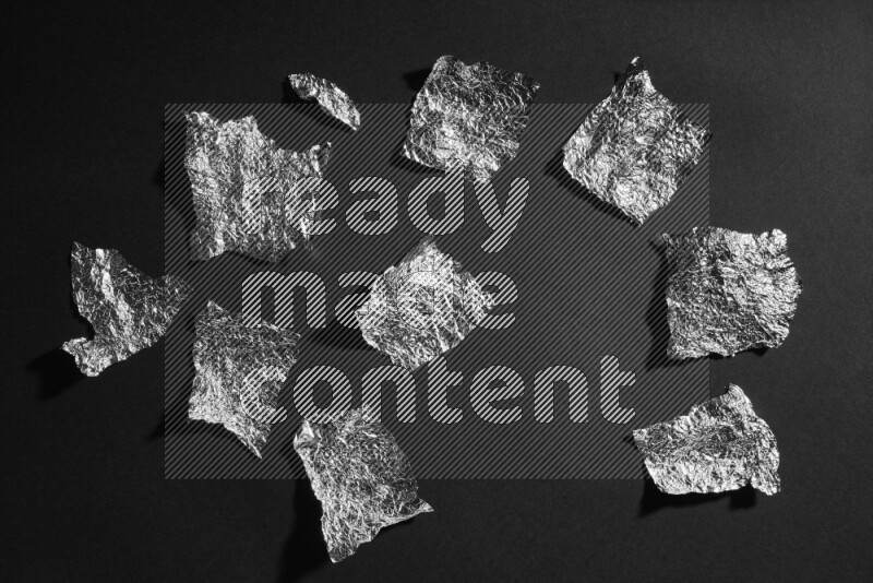 Aluminium foil on black background