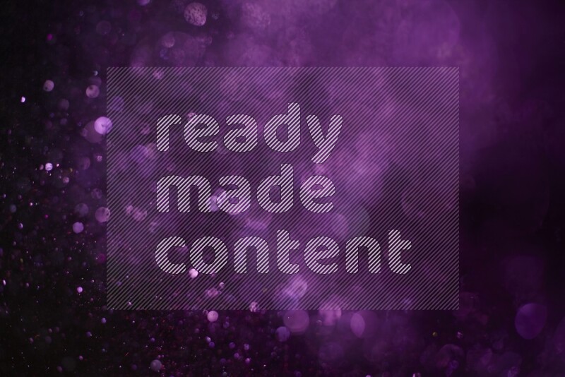 Purple glitter powder isolated on black background