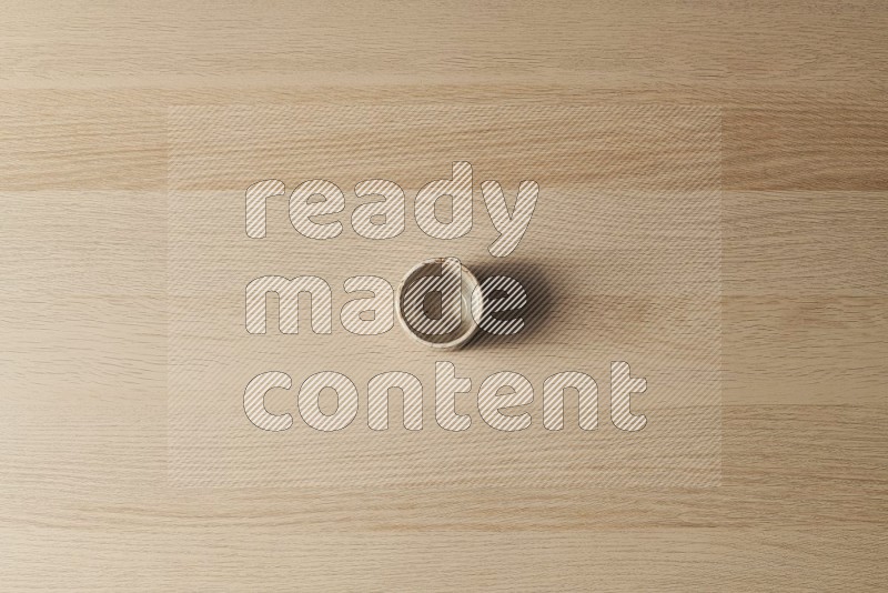 Top View Shot Of A Pottery Cup on Oak Wooden Flooring