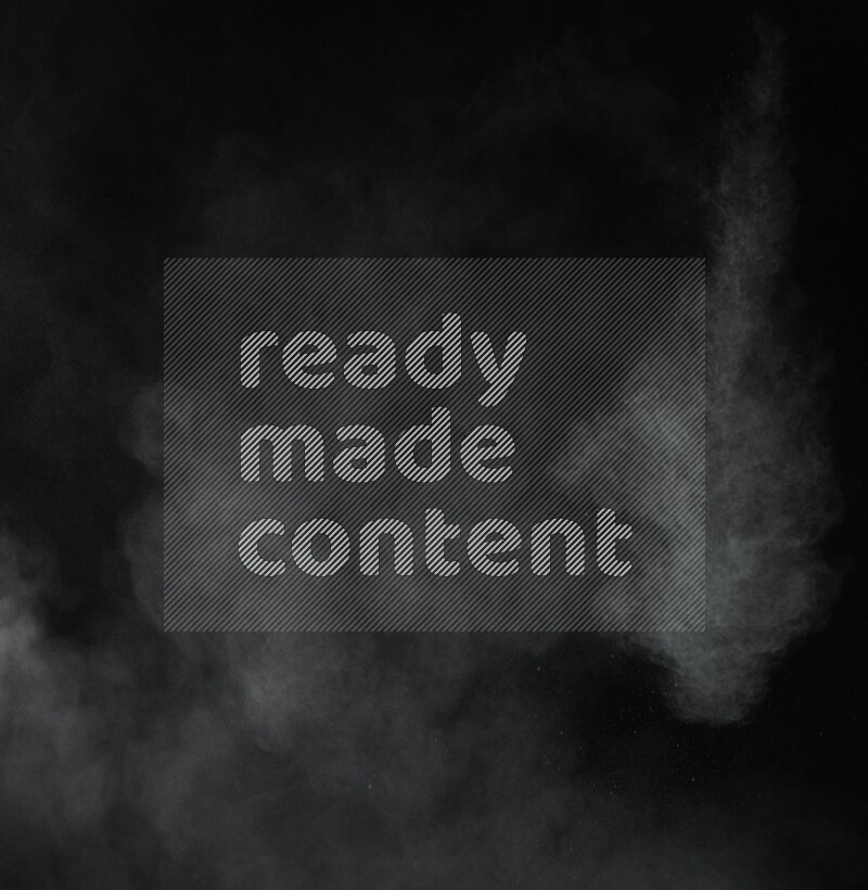 A side view of green powder explosion on black background