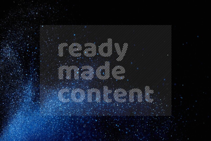 Blue glitter powder isolated on black background