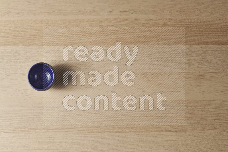 Top View Shot Of A Pottery Cup on Oak Wooden Flooring