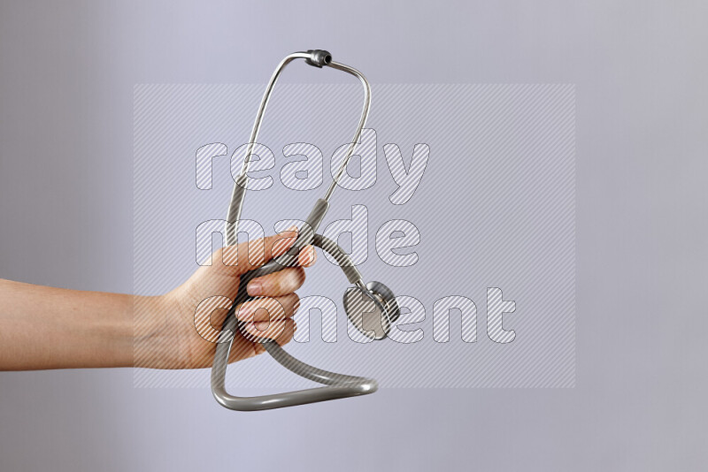 Female doctor wearing an abaya and medical attire in different positions