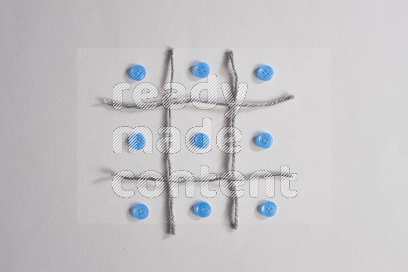 Blue buttons placed on grey background