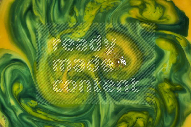 A close-up of abstract swirling patterns in orange and green