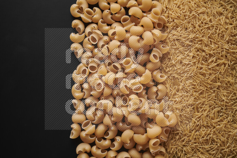 Different pasta types on black background