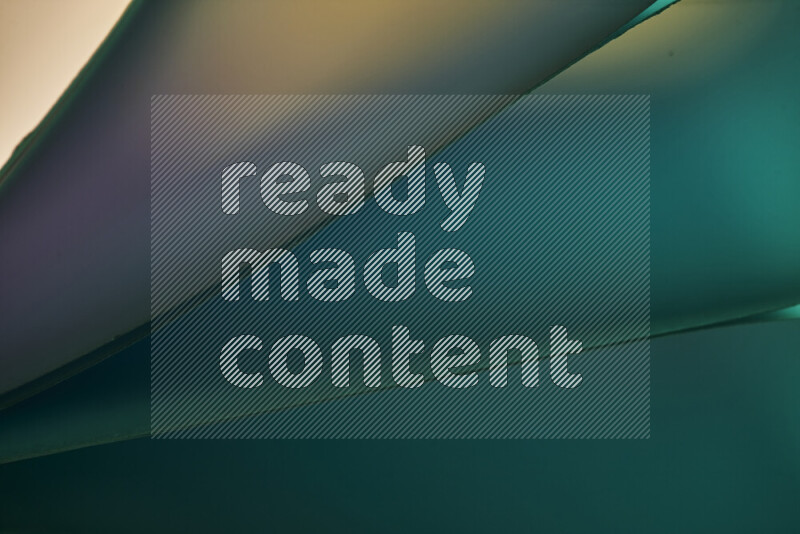 فن تجريدي يعرض منحنيات مع تدرجات الألوان الباردة مكونه بضوء ملون