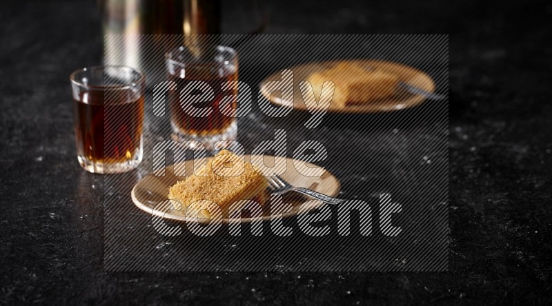 konafa with tea in a dark setup