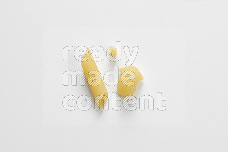 Different pasta types on white background
