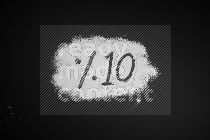 Percentages written with powder on black background