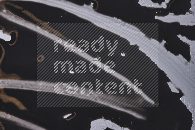 Close-ups of abstract black paint texture in different shapes