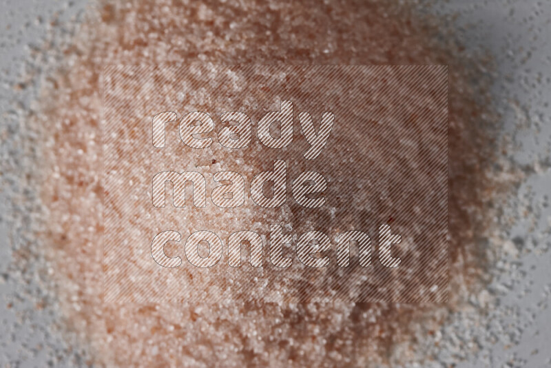 A bunch of fine himalayan salt on white background