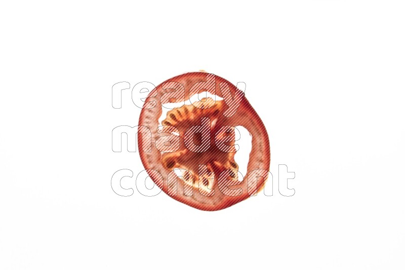 Tomatoes slices on illuminated white background