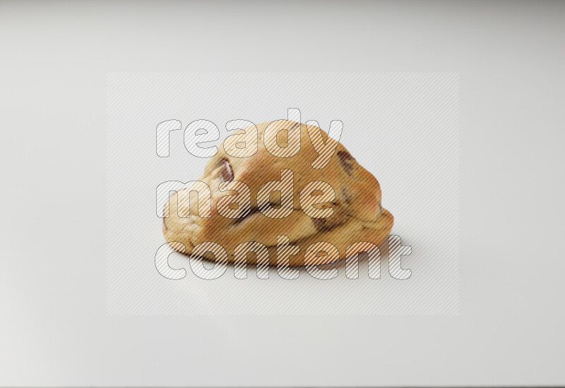 a chocolate chip cookie on a white background