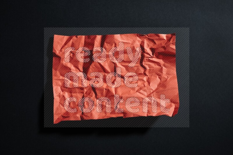 White paper sheet on black background