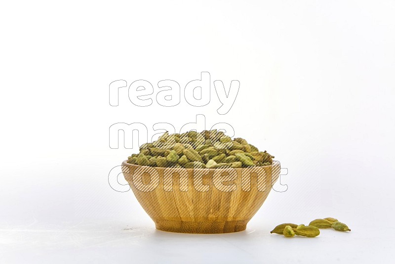 Cardamon in a container on white background