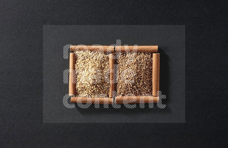 2 squares of cinnamon sticks full of mustard seeds and sesame on black flooring