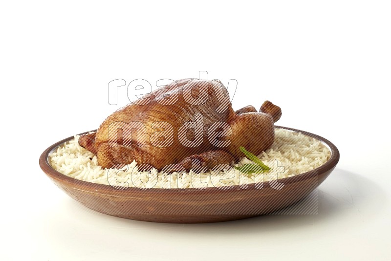 white  basmati Rice with  whole roasted chicken    on a pottery plate  direct  on white background