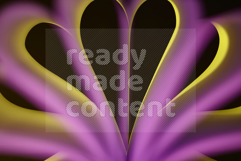 فن تجريدي يعرض منحنيات وتدرجات اللون الأصفر والوردي مكونه بضوء ملون