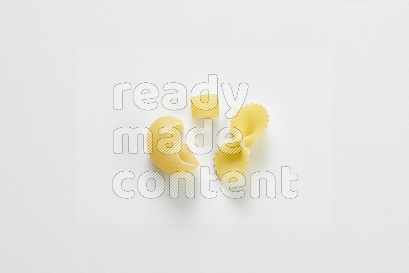 Different pasta types on white background