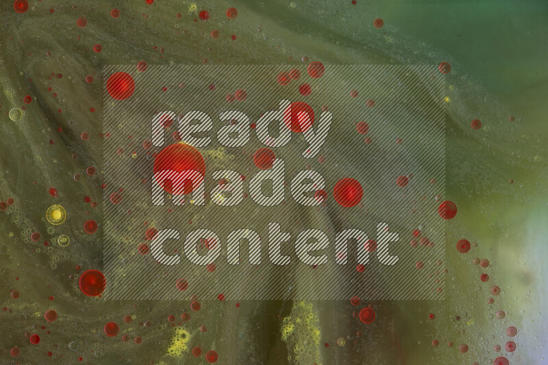 تلتقط الصورة تناثرا للطلاء الأحمر والأخضر والأصفر علي الخلفية