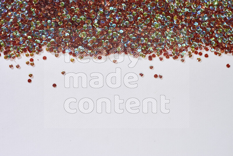 Multicolored flat sequins on grey background