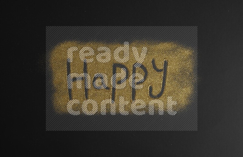 A word written with gold glitter on black background