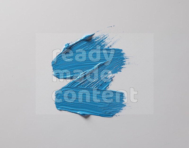 Multi blue straight brush strokes in different shapes on a white background