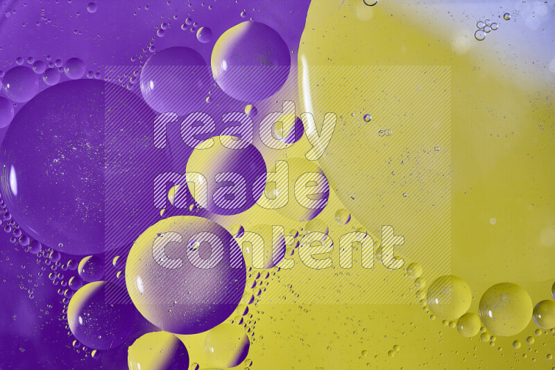 Close-ups of abstract oil bubbles on water surface in shades of purple and yellow