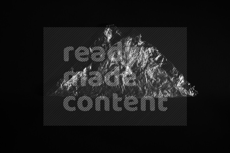 Transparent plastic textures on black background