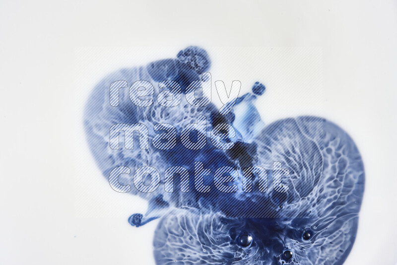 A close-up of abstract swirling patterns in blue and white