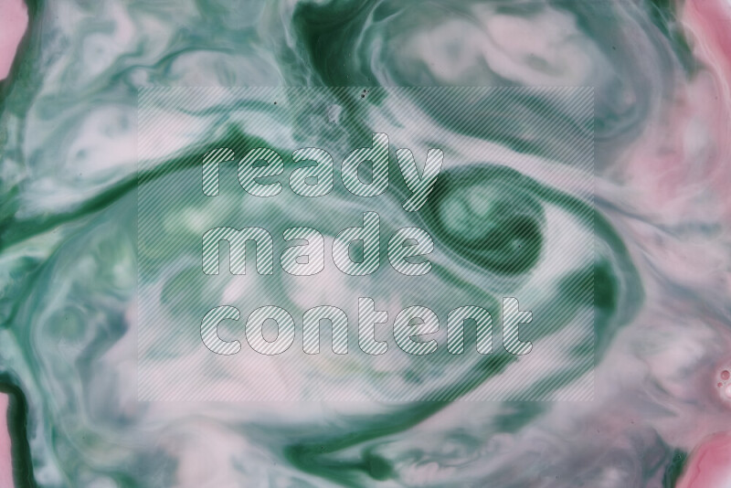 صورة مقربة لأنماط دوامية مجردة باللون الأحمر والأخضر