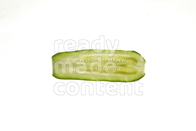 Zucchini slices on illuminated white background