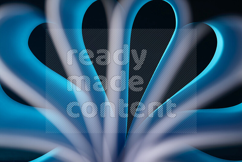 An abstract art piece displaying smooth curves in white and blue gradients created by colored light