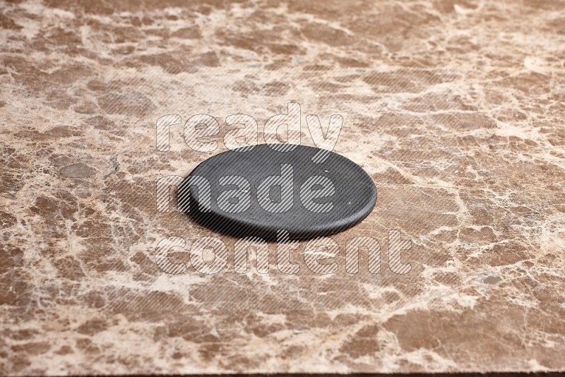 Flat Pottery Plate Coaster on Beige Marble Flooring, 45 degrees
