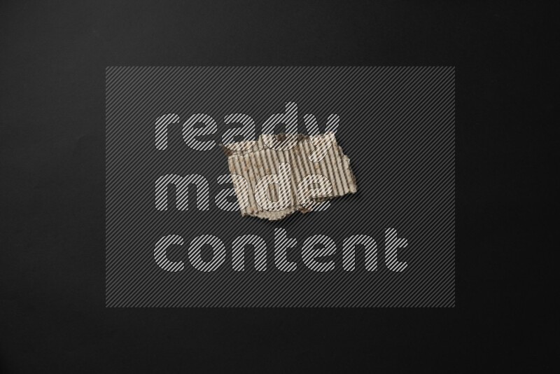 Cardboard on black background