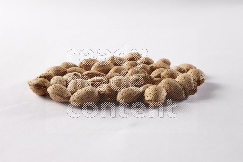 Almonds on white background