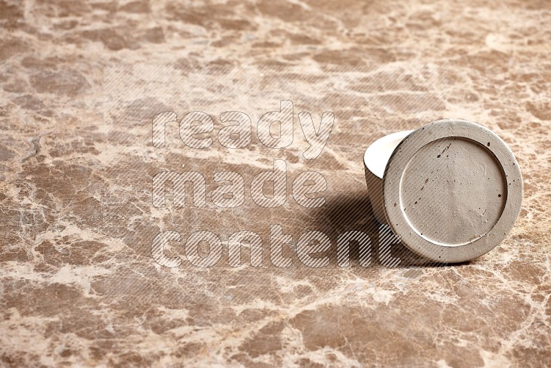 White Pottery Bowl on Beige Marble Flooring, 45 degrees