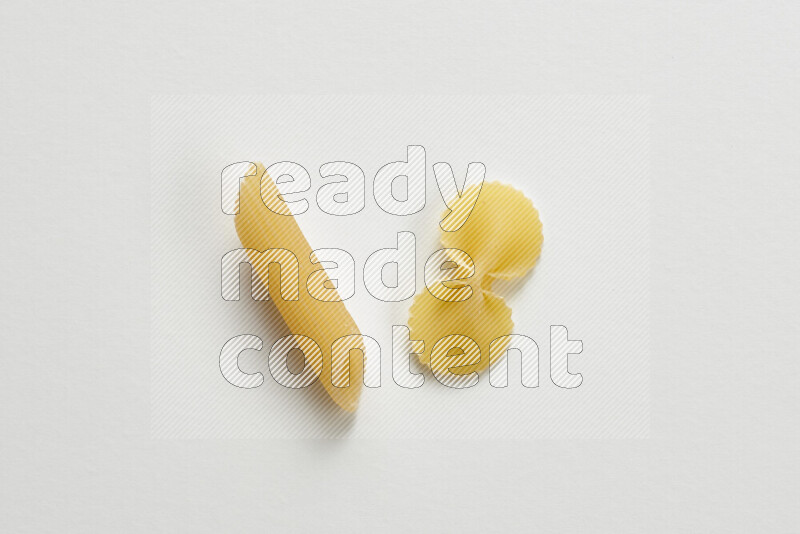 Different pasta types on white background