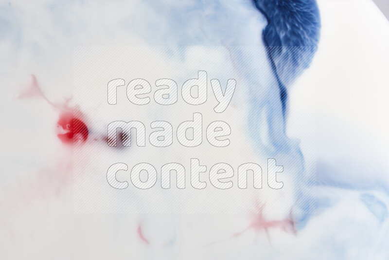 لقطة مقربة لأنماط دوامية باللون الأزرق والأحمر والأبيض