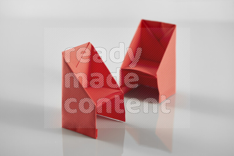 Origami dinning room on grey background