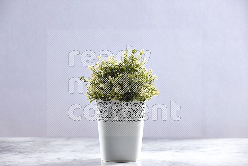 Artificial Thyme Plant in White Decorative Pot on Light Grey Marble Flooring 15 degree angle