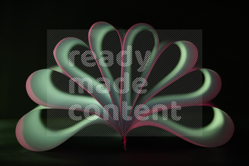 An abstract art piece displaying smooth curves in pink and green gradients created by colored light