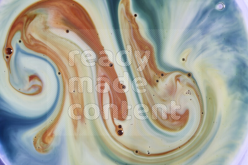 A close-up of abstract swirling patterns in green, blue and red