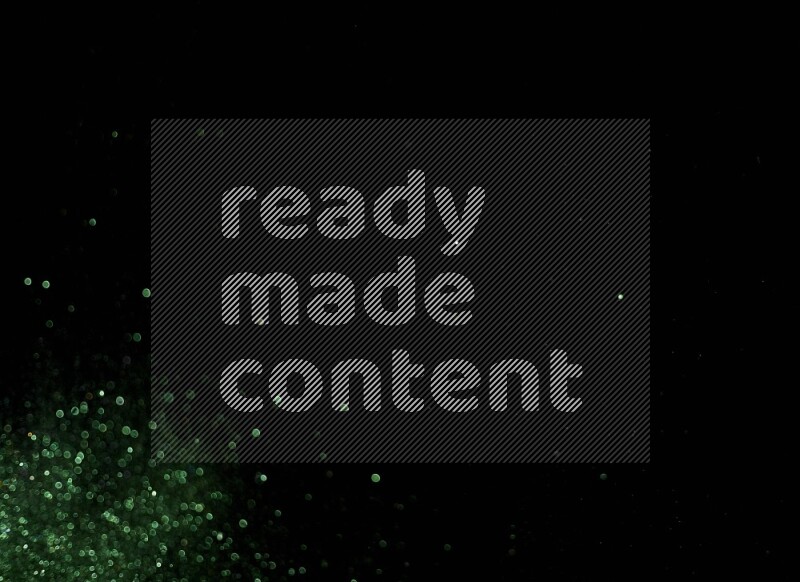 Green glitter powder isolated on black background