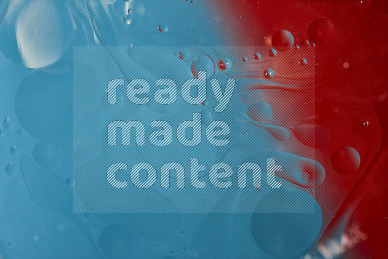 Close-ups of abstract oil bubbles on water surface in shades of blue and red