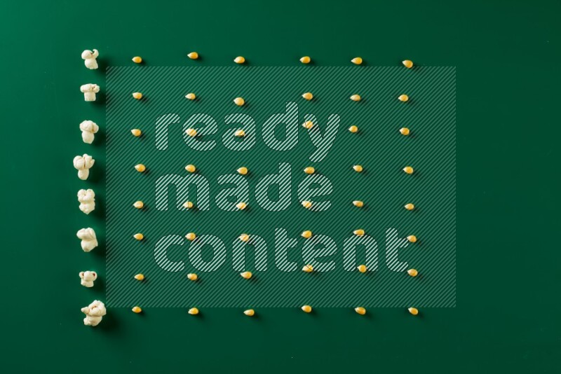 Popcorn flakes and seeds on a green background in a top view shot