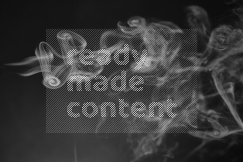 Motion of wavy smoke isolated on dark background