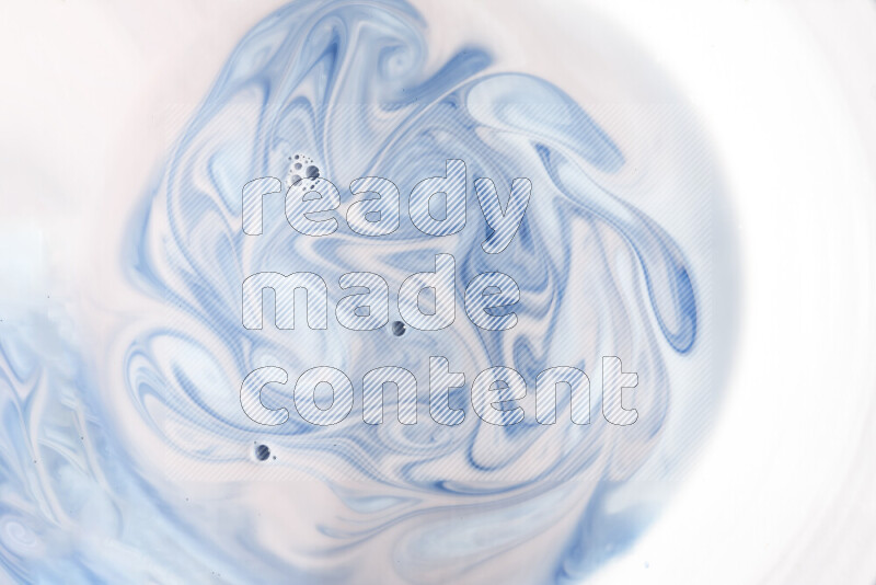 A close-up of abstract swirling patterns in blue and white